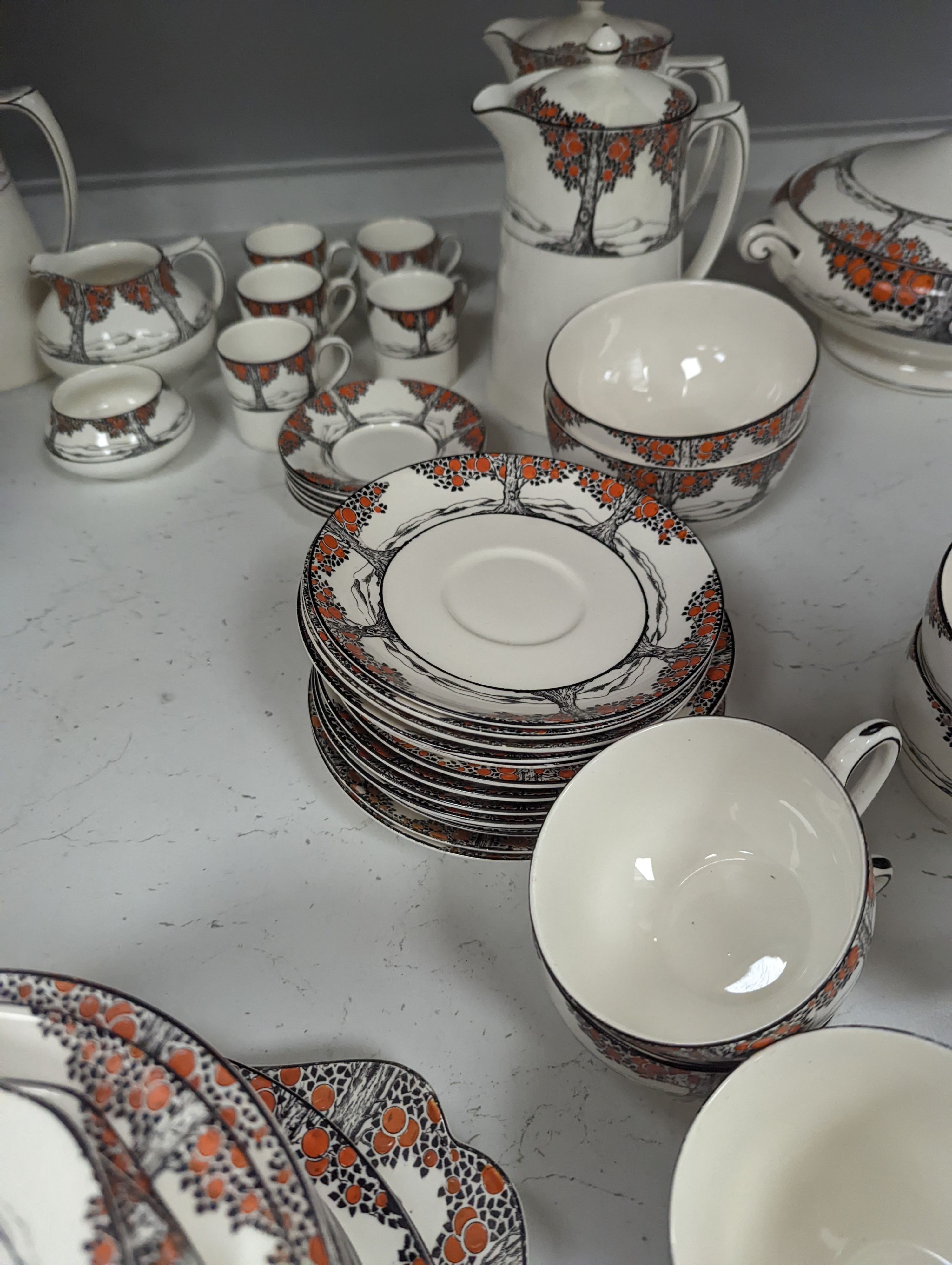 A Crown Ducal Orange Tree pattern tea, coffee and part dinner service